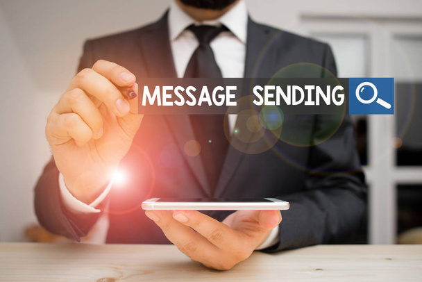 Conceptual hand writing showing Message Sending. Business photo showcasing to convey or communicate one s is feelings or desires Male human wear formal clothes present use hitech smartphone. - Fotó, kép