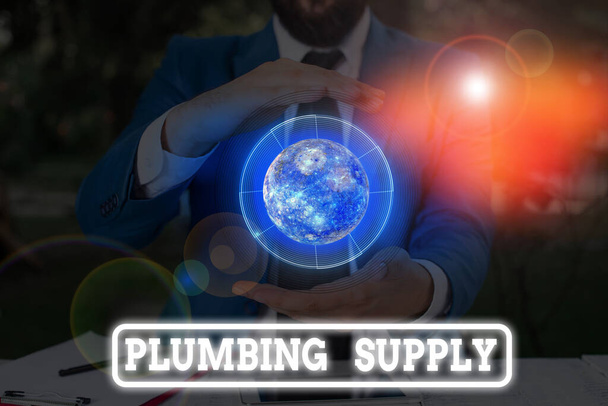 Conceptual hand writing showing Plumbing Supply. Business photo text tubes or pipes connect plumbing fixtures and appliances Elements of this image furnished by NASA. - 写真・画像