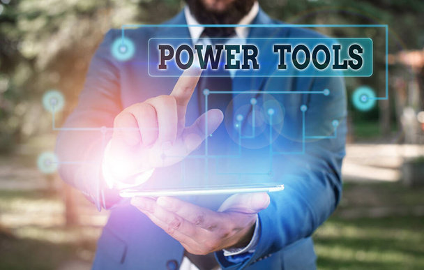 Konceptualne pismo ręczne pokazujące Power Tools. Business photo text tool, który jest uruchamiany przez dodatkowe źródło zasilania i mechanizm. - Zdjęcie, obraz