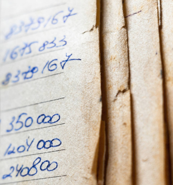Old paper documents in the archive. Bookkeeping (accountancy). - Photo, Image