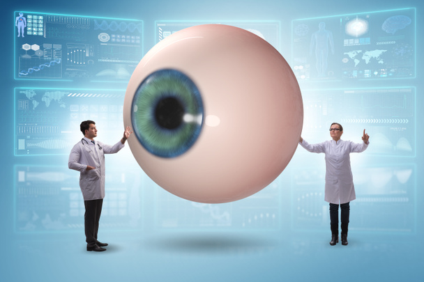 Dokter onderzoekt reusachtig oog in medisch concept - Foto, afbeelding