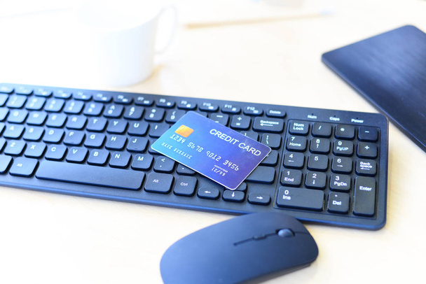 Credit card on keyboard computer Online payment for purchases from online stores / Online shopping technology pay concept  - 写真・画像