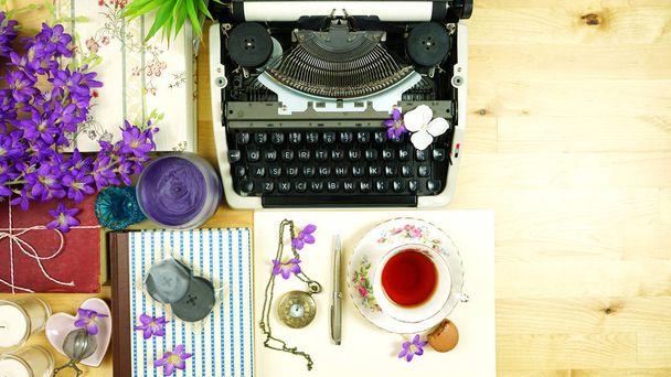 Vintage writers desk creative composition flat lay with typewriter and books. - Zdjęcie, obraz