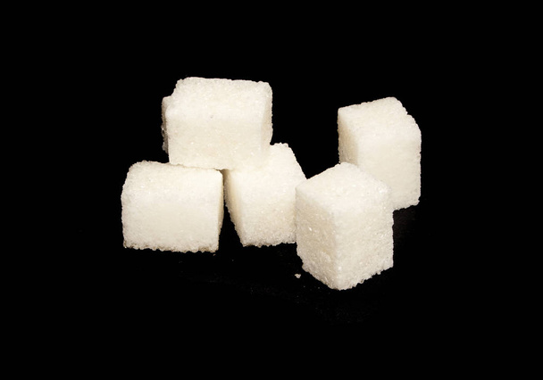 sucre isolé sur fond noir - Photo, image