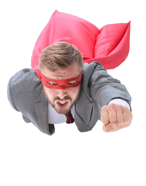 flying superhero businessman looking at the camera. - Foto, afbeelding