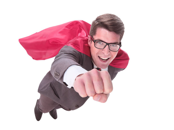 confident superhero businessman is flying to you - Foto, afbeelding
