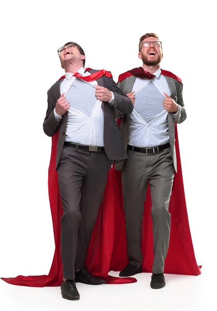 dois colegas de negócios em capas vermelhas em pé no Superman pose
 - Foto, Imagem