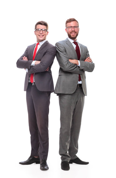 in full growth. two confident business men standing together - Фото, изображение