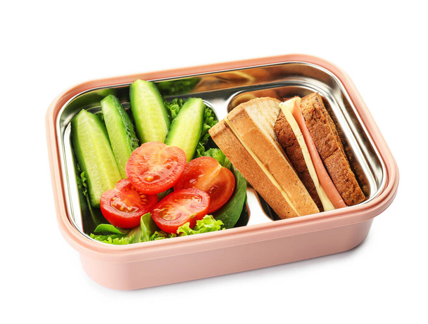 Boîte à lunch scolaire avec une nourriture savoureuse sur fond blanc
 - Photo, image