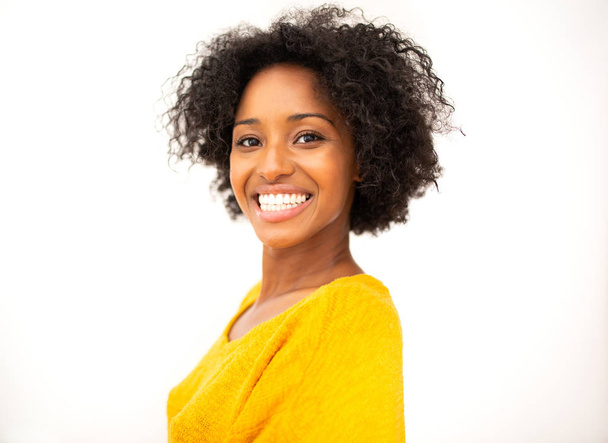 Close up side portrait smiling african american woman against isolated white background - Fotoğraf, Görsel