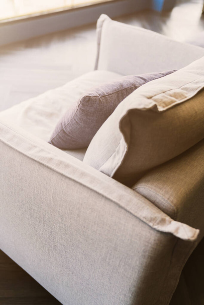 close up of soft fabric pillow decoration on beautiful sofa in living room home design concept - Fotoğraf, Görsel