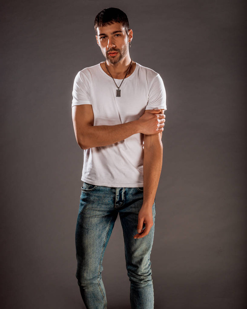 Full body shot of a trendy young man wearing modern style clothes - Photo, Image