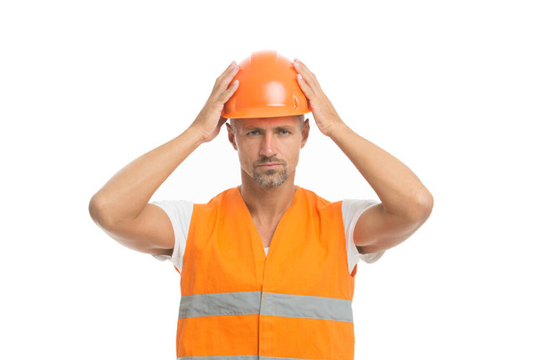 repairing and construction. man in orange helmet. engineer wear hardhat. protect yourself being a mechanic. Professional Construction Worker. serious worker in safety vest and helmet. electrician - Foto, immagini