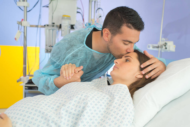 partner helps his wife during the childbirth - Photo, Image