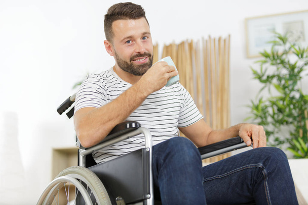disable man having a coffee - Фото, зображення