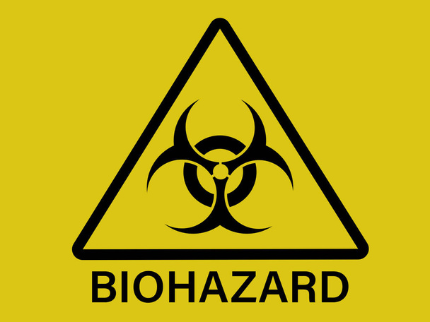 Black triangle biohazard warning sign isolated on a yellow background with text - Photo, Image