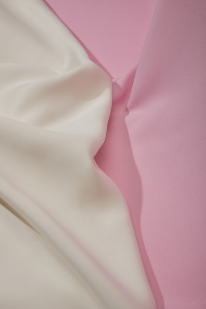 close up view of pink and white soft and wavy fabric - 写真・画像