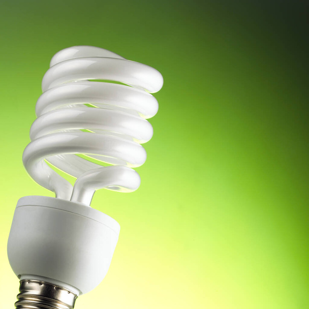 Fluorescent lamp on green background - Photo, Image