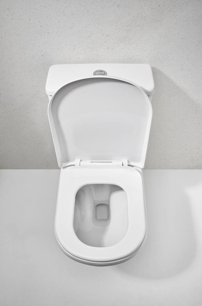 Toilet in top view with open seat cover - Foto, Bild