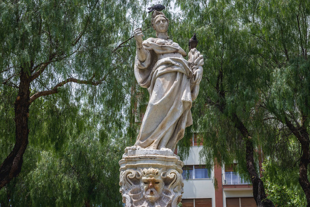 Statue on the Ceres Fountain on Cavour Square in Borgo area of Catania city on Sicily, Italy - Photo, Image