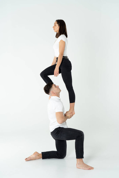 Duo Of Acrobats Showing Tricks, Isolated On White - Valokuva, kuva