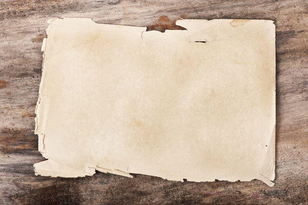 Paper on old wooden background - Foto, imagen