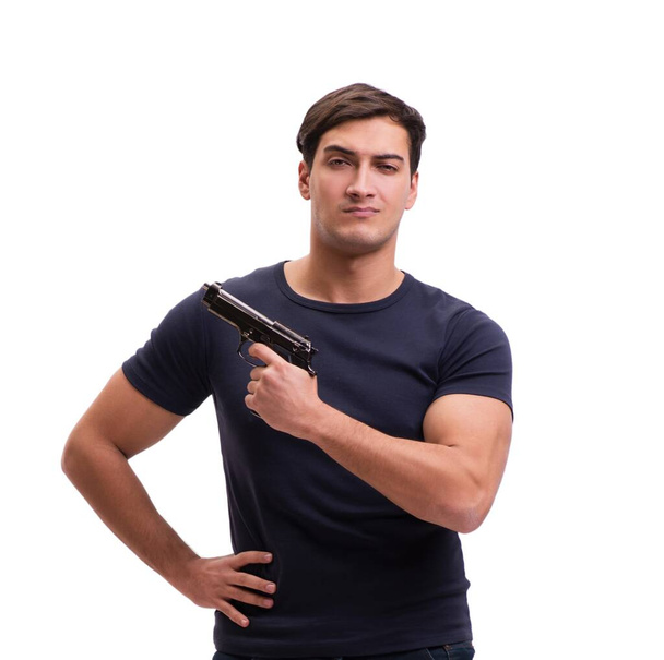 Aggressive young man with gun isolated on white - Photo, Image
