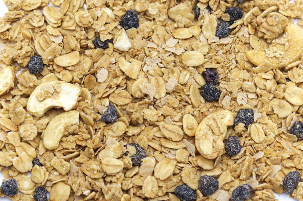 Organic homemade crunchy Granola cereal with maltflakes currant flavour. Texture and background. Top view or flat-lay. Copy space for text. - Photo, Image