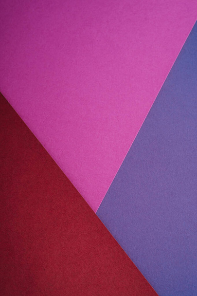 Paper triangle geometric texture in red, purple and blue colors - Φωτογραφία, εικόνα