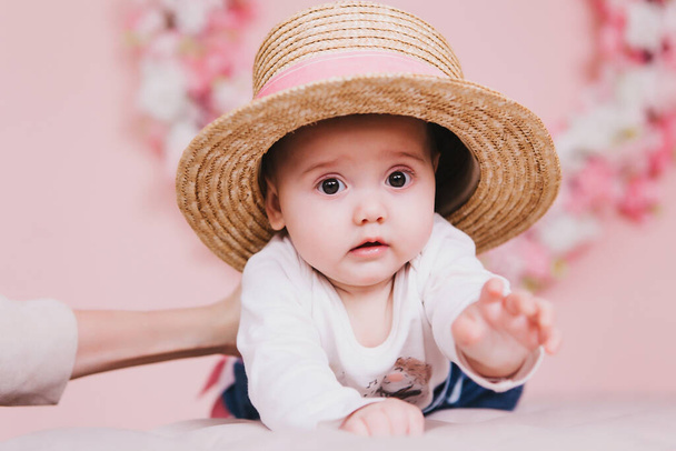 Image of sweet adorable baby girl with pink flowers - Fotografie, Obrázek