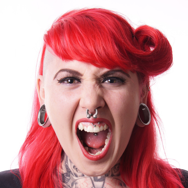 Woman with piercings screaming - Photo, Image