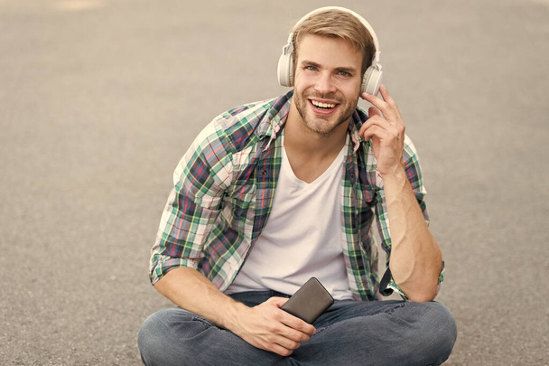Audio library. Another way of learning. Man handsome college student headphones. Online learning. Audio book concept. Educational technology. E learning. Study anywhere. Worldwide knowledge access - Photo, Image