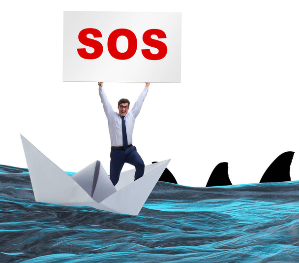 ビジネスマンはボートでSOSメッセージの助けを求める - 写真・画像