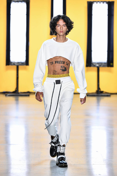 NEW YORK, NEW YORK - SEPTEMBER 05: A model walks the runway for Dirty Pineapple during New York Fashion Week: The Shows at Gallery I at Spring Studios on September 05, 2019 in New York City. - Photo, Image