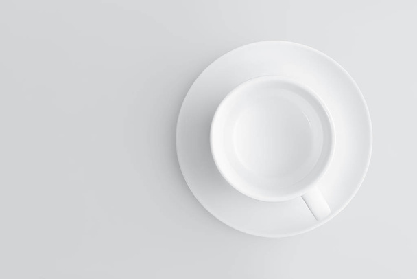 Top view of an empty coffee cup on a saucer on a gray background with copy space - Fotoğraf, Görsel