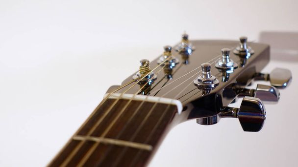 guitar headstock closeup . white  background - Foto, afbeelding
