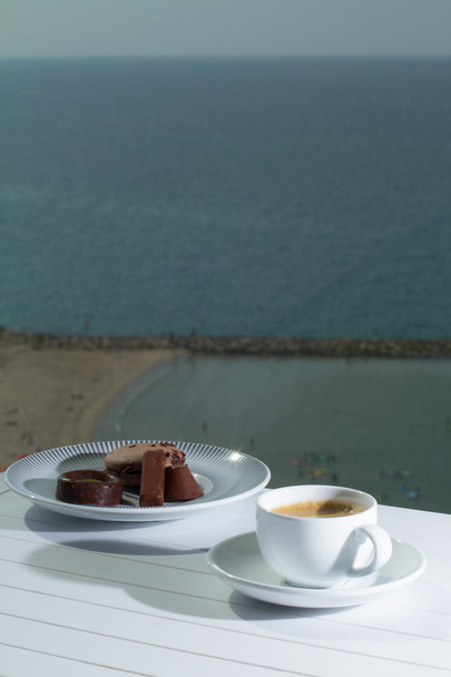 morning coffee with view to the beach - Photo, Image