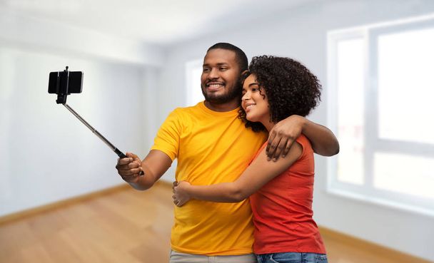 african american couple taking selfie by cellphone - Photo, Image