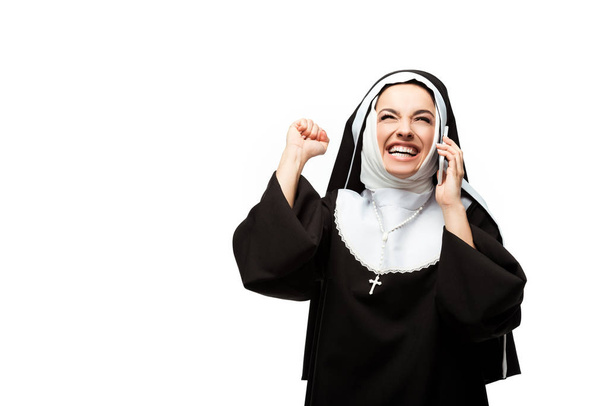 excited nun talking on smartphone isolated on white - Photo, Image