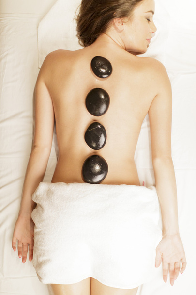 hete steen massage therapie - Foto, afbeelding