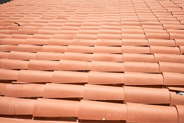 Close up of rooftop with classic orange roof tiles - Valokuva, kuva