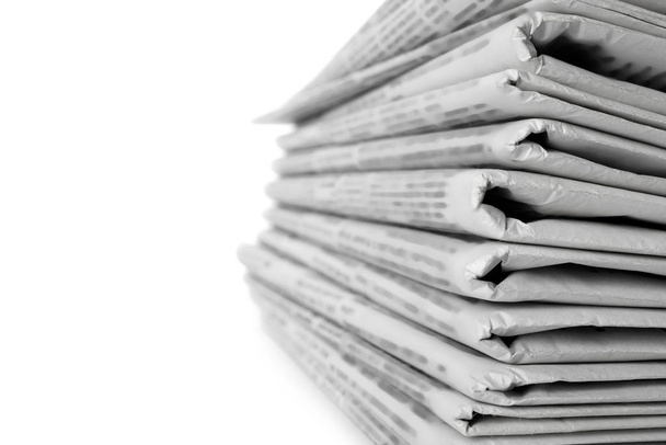 Stack of newspapers on white background, closeup. Journalist's work - Photo, Image