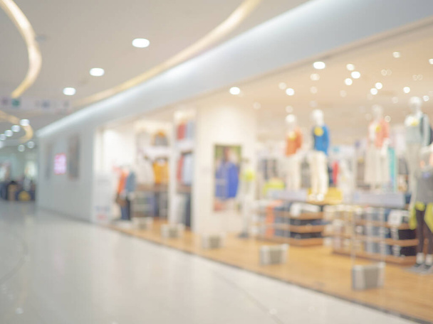 loja de roupas borradas no fundo, borrão abstrato na loja de roupas no fundo do shopping
 - Foto, Imagem