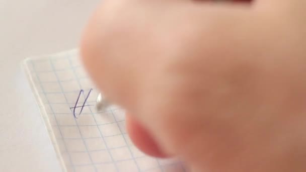 a guy writes with a pen in a notebook a letter : Hi dad, I gay .. after writing, he crosses out what was written. Extreme close-up, Full HD. Point of view first person. - Filmmaterial, Video