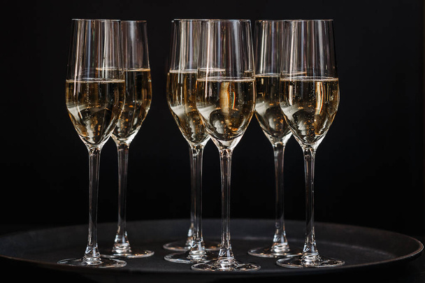 Glasses of champagne for a holiday and event - Фото, зображення