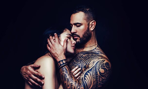 Love and desire. Latino man hugging adorable woman with love. Sensual couple in love. Erotic love of hispanic man and sexy woman - Foto, Imagen