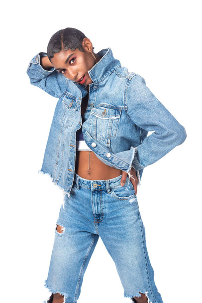 Slender young African American woman in distressed denim - Photo, Image