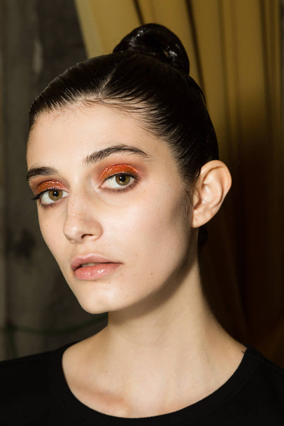 MILAN, ITALY - FEBRUARY 22: Gorgeous model poses in the backstage just before Cividini show during Milan Women's Fashion Week on FEBRUARY 22, 2020 in Milan. - Foto, Imagen