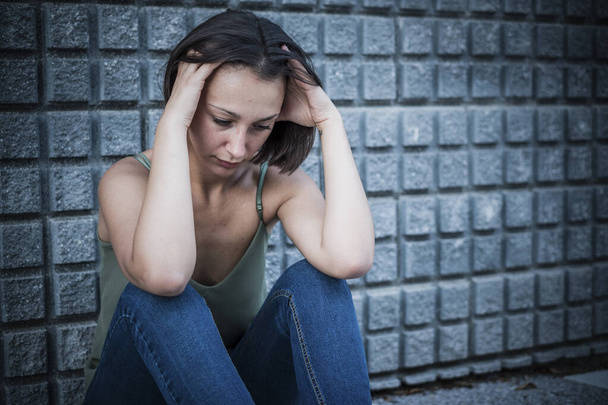 Depressed and anxious young girl portrait - Фото, зображення