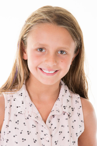Portrait of a pretty little girl caucasian cheerful smile - Valokuva, kuva